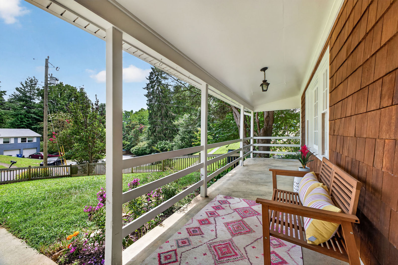 Covered front porch looking out over the Kenilworth street below
